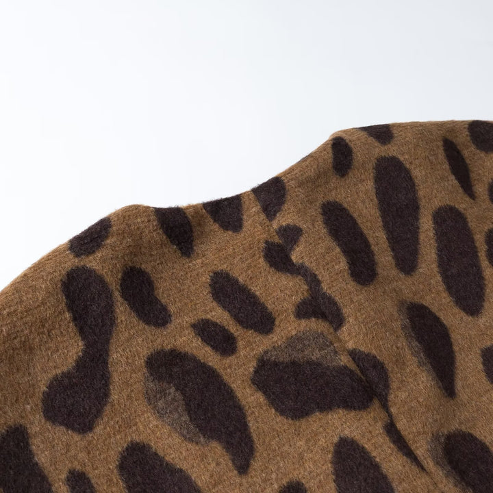Ladies sleeveless wool blend vest in leopard print with V-neck and decorative button Mune Fashion