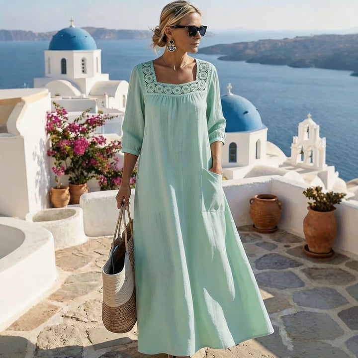 Ladies max dress with elegant round neckline and practical pockets Mune Fashion