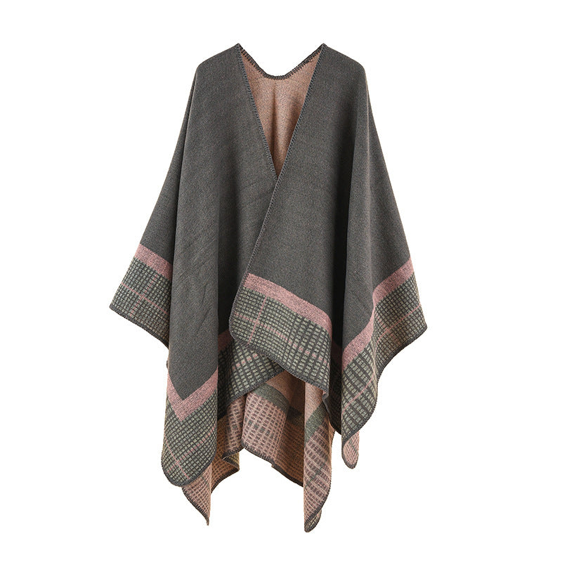Women's wool blend poncho in asymmetric pointed cut with woven check border Mune Fashion