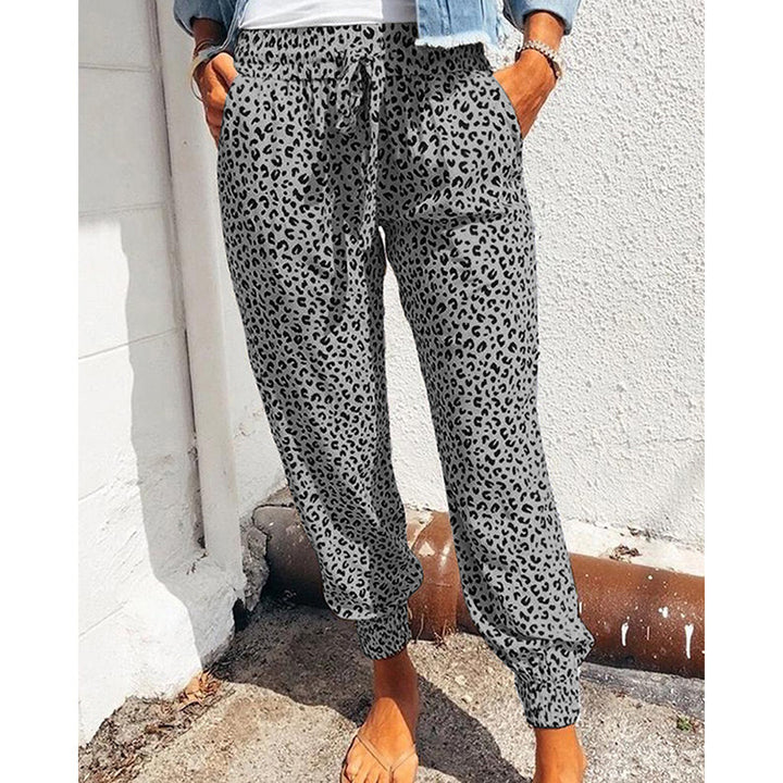 Ladies casual leopard print jogging pants with drawstring, side pockets, and elastic cuffs Mune Fashion