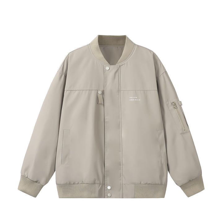 Unisex Short-cut padded bomber jacket with zippered sleeve pocket and ribbed cuffs Mune Fashion