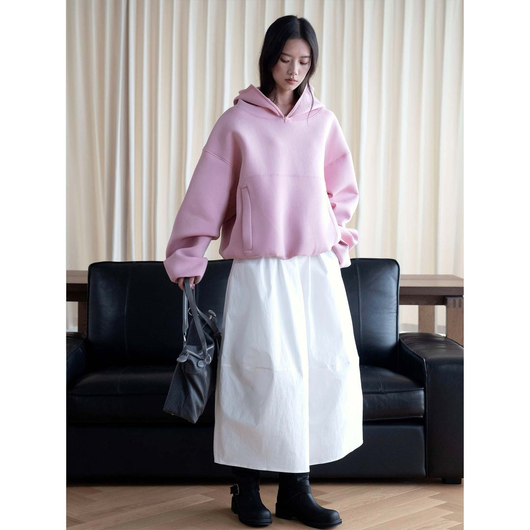 Women's midi skirt with high elastic waistband, flowing wide design and practical side pockets Mune Fashion