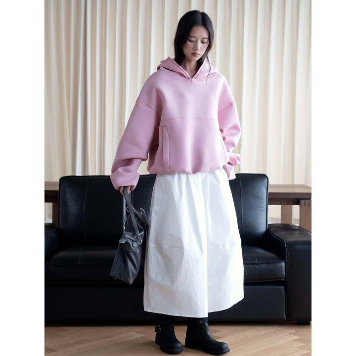 Women's midi skirt with high elastic waistband, flowing wide design and practical side pockets Mune Fashion