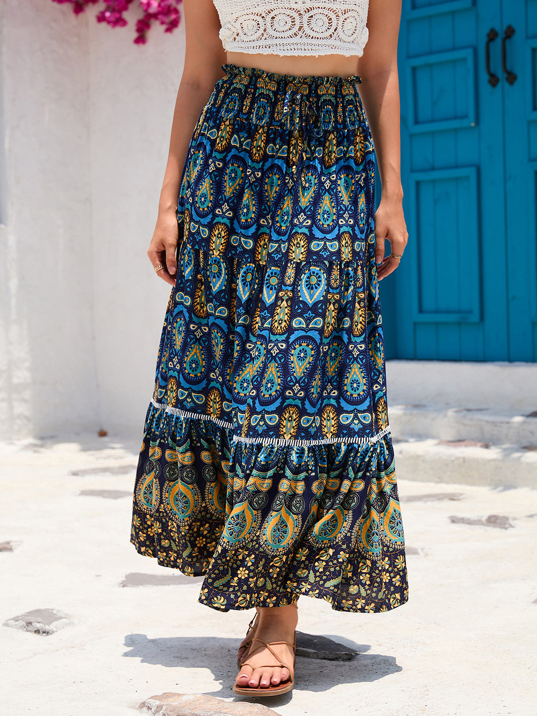 Women's maxi skirt in boho style with tiers, gathered elastic waistband and paisley print Mune Fashion