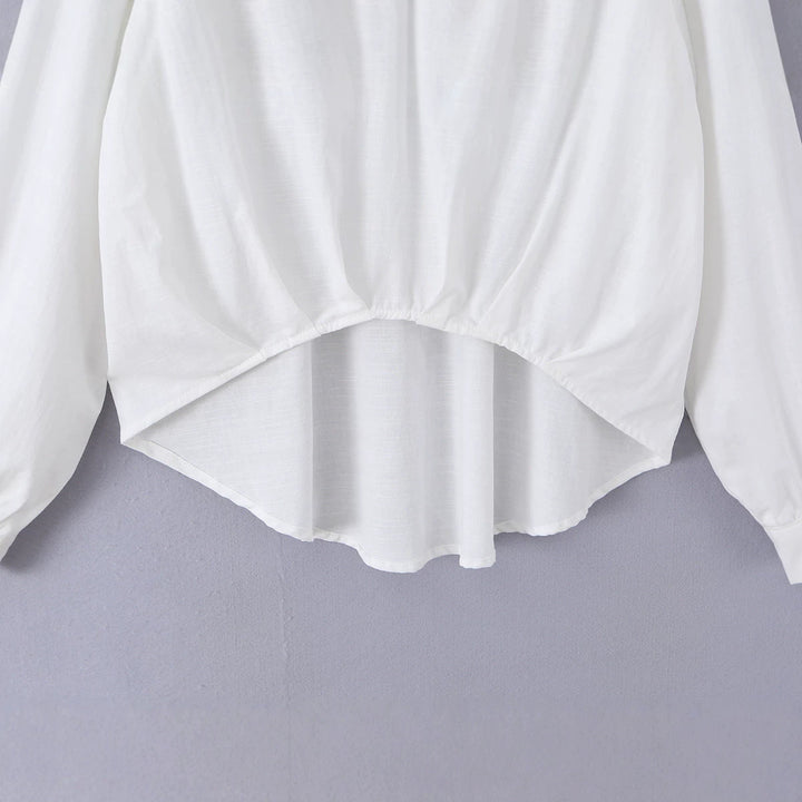 Women's oversized blouse with deep V-neck, shirt collar, and gathered front hem Mune Fashion