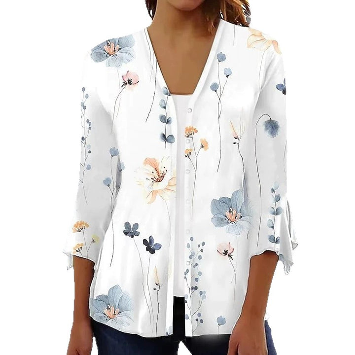 Women's light chiffon blouse with watercolor flower print, V-neck, button placket and three-quarter sleeves Mune Fashion