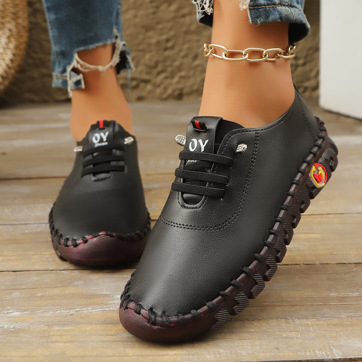 Women's Comfortable Leather-Look Slippers with Flexible Profile Sole and Moccasin Stitch