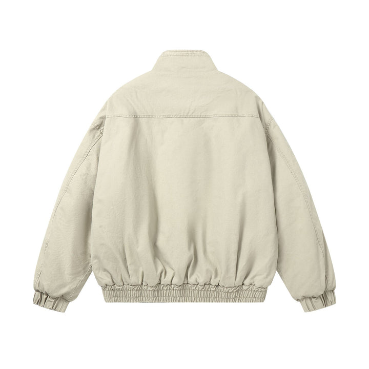 Women's boxy quilted bomber jacket with high stand-up collar and elastic hem