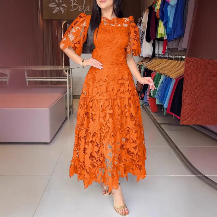 Women's maxi dress made of floral guipure lace with a fitted silhouette and tiered hem Mune Fashion