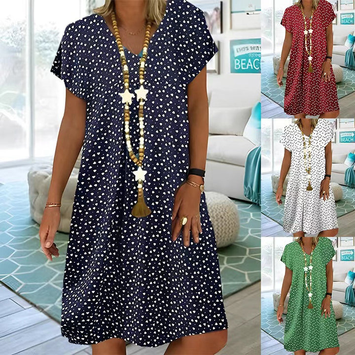 Ladies nan locker falling V-neck short dress with A-line cut, cap sleeves and all-over heart print Mune Fashion