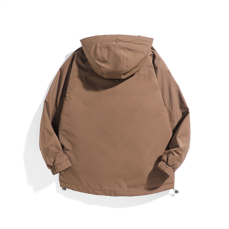Unisex Wide cut weatherproof parka with hood, drawstring and patch pockets Mune Fashion