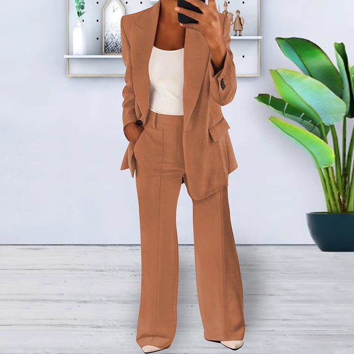 Women’s office-appropriate pantsuit set with wide trousers and tailored blazer Mune Fashion