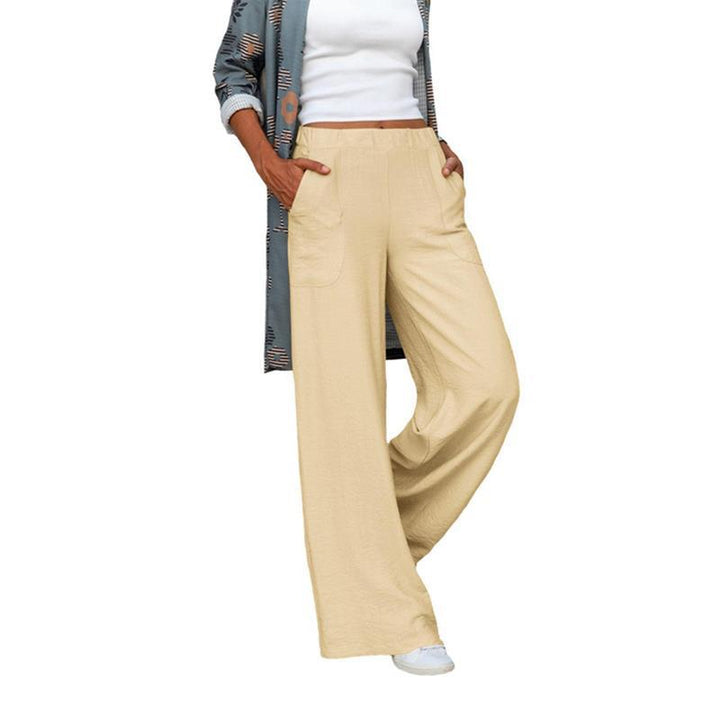 Women’s wide linen blend pants with high elastic waistband and applied side pockets Mune Fashion