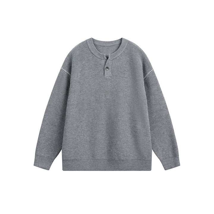 Unisex chunky knit henley pullover with button placket and drop shoulder drape
