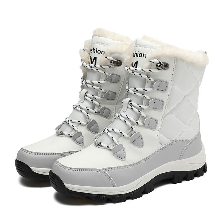 Ladies thermal snow boots with quilted insulation, teddy lining, and grippy profile sole Mune Fashion