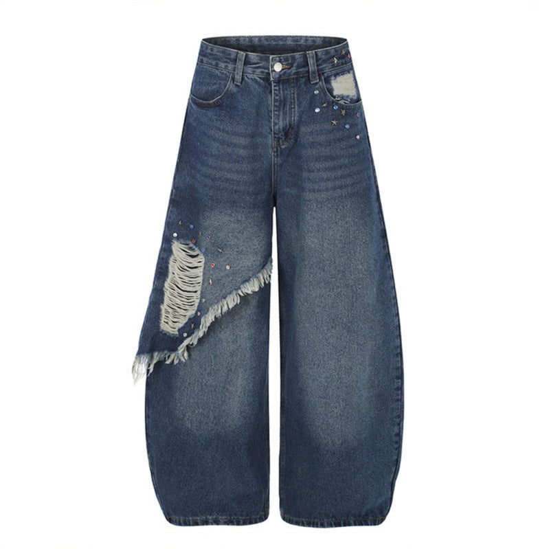 Women's high-waist wide palazzo jeans with asymmetric fringe detail and rhinestone application Mune Fashion