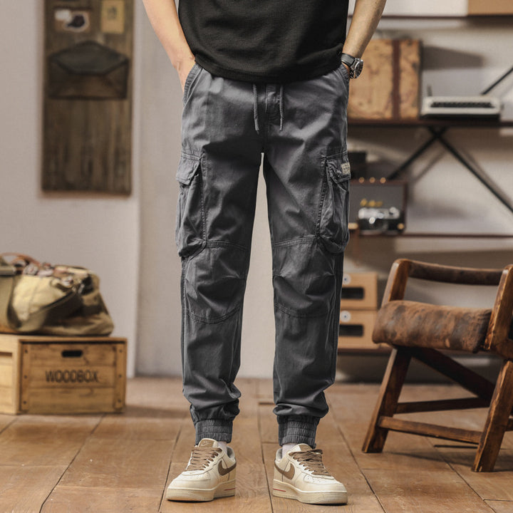 Herren Cargo-Jogginghose im Utility‑Stil mit elastischem Tunnelzugbund und verstärkten Kniepaneelen Mune Fashion