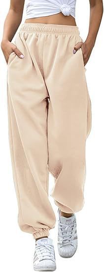 Women's Baggy Sweatpants in Retro Look with high comfort waistband, low drop, side pockets, and elastic ankle cuffs Mune Fashion