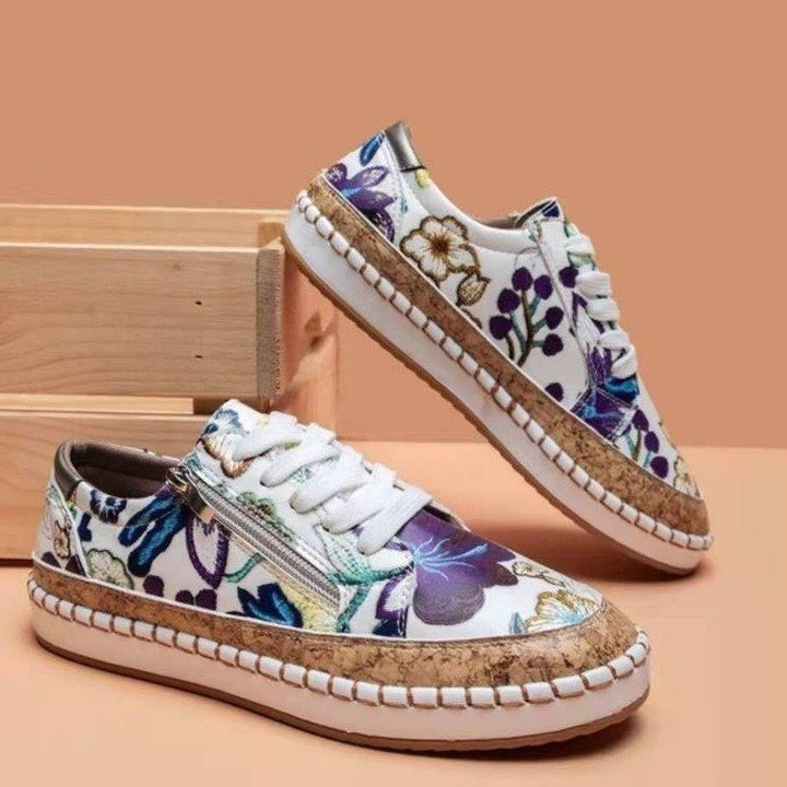 Women's floral platform sneaker with cork platform, side zipper and cushioned comfort insole Mune Fashion