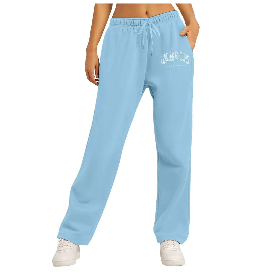 Ladies high-waisted lounge pants with elastic waistband and side pockets Mune Fashion
