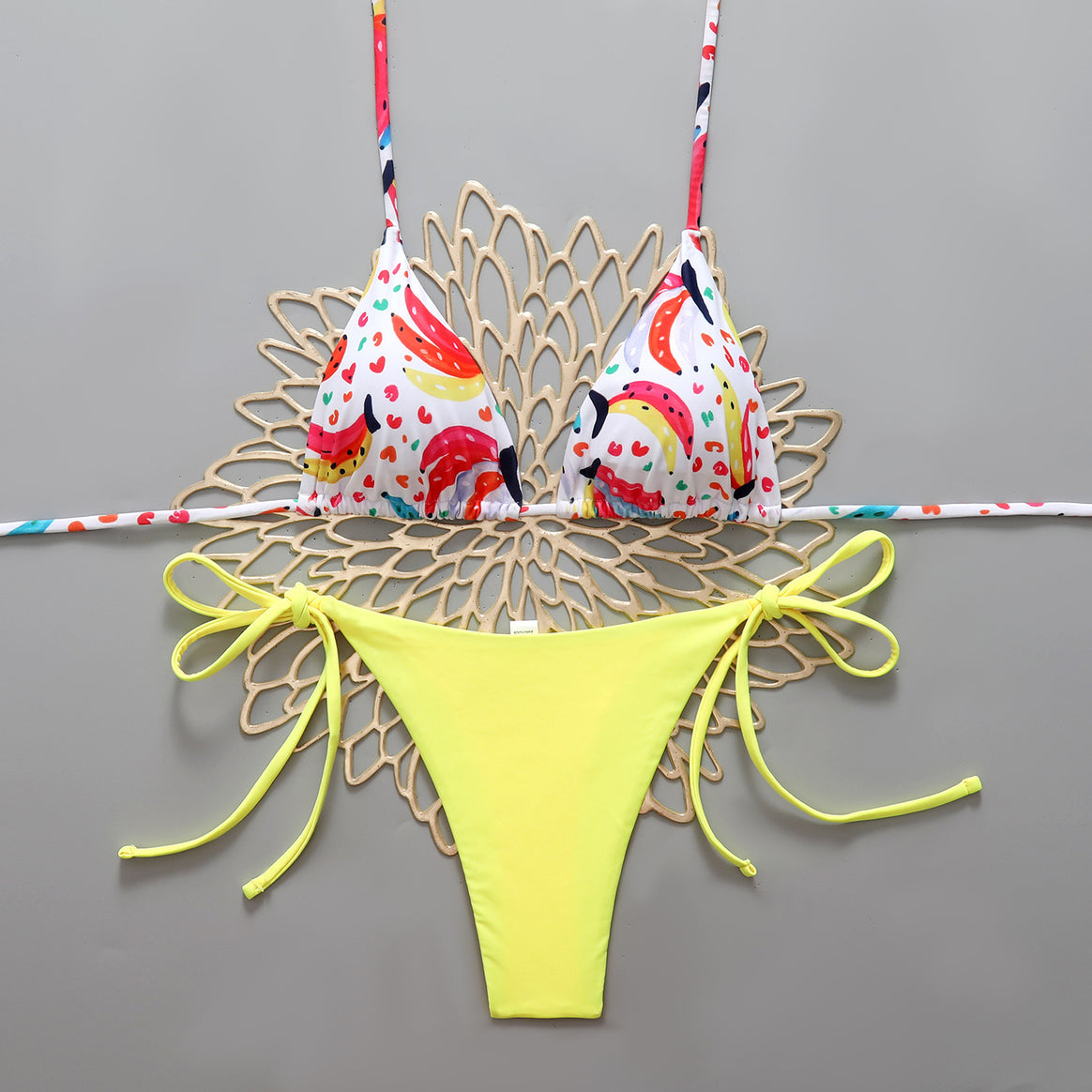 Women’s bikini set with colorful designs and adjustable side straps Mune Fashion