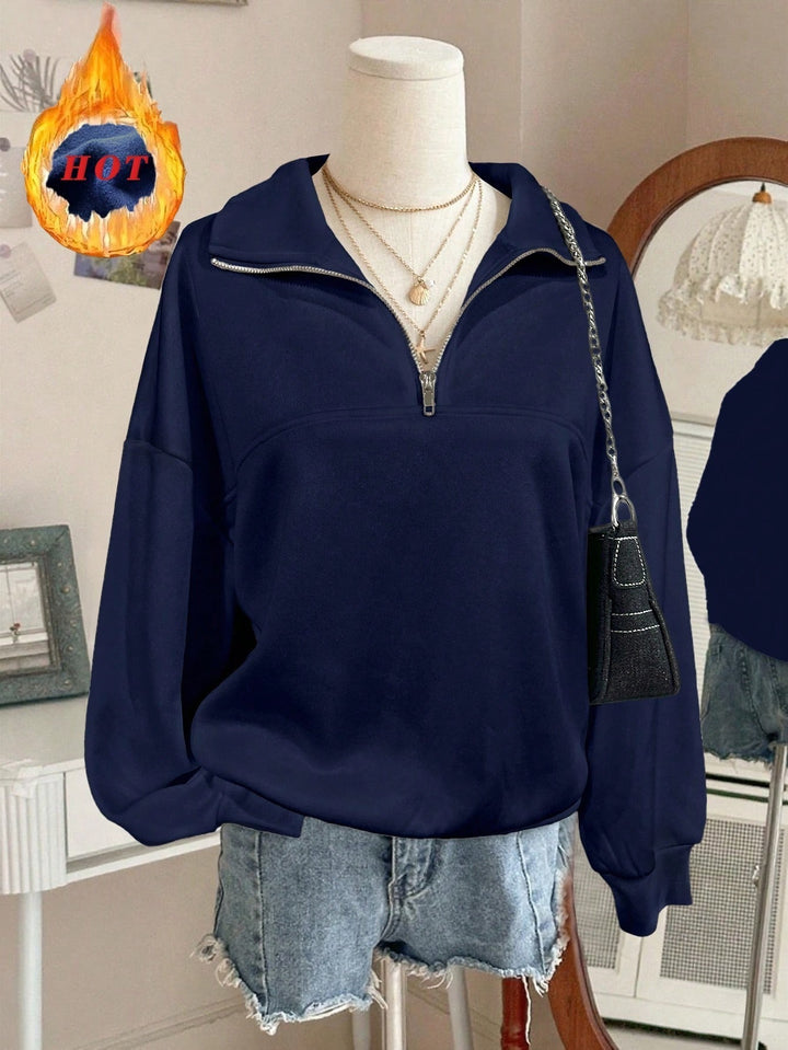 Women's oversized sweatshirt with half zipper, high collar and balloon sleeves Mune Fashion