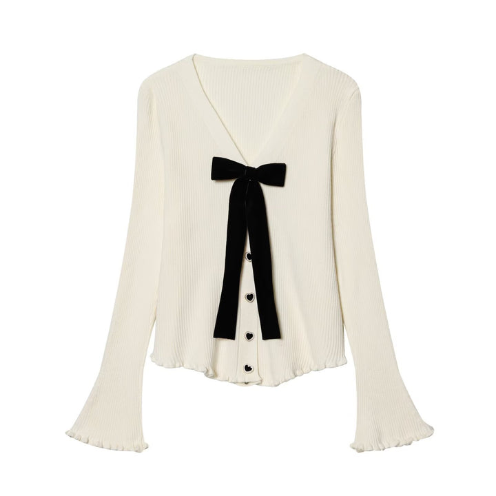 Women's ribbed cardigan with V-neck, bell sleeves, heart button placket and velvet bow Mune Fashion