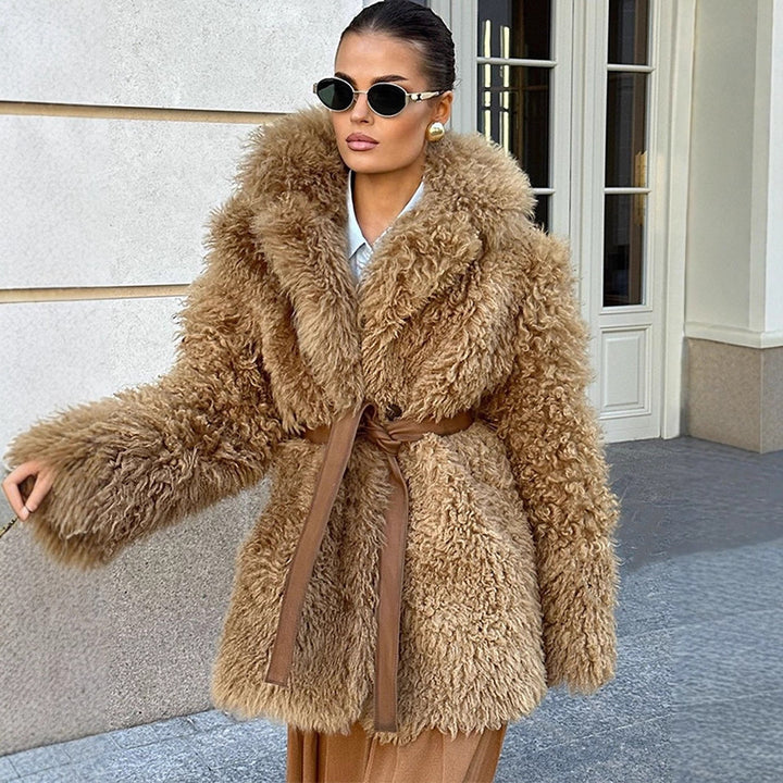 Women’s short coat made of voluminous bouclé faux fur with wrap and waist belt Mune Fashion