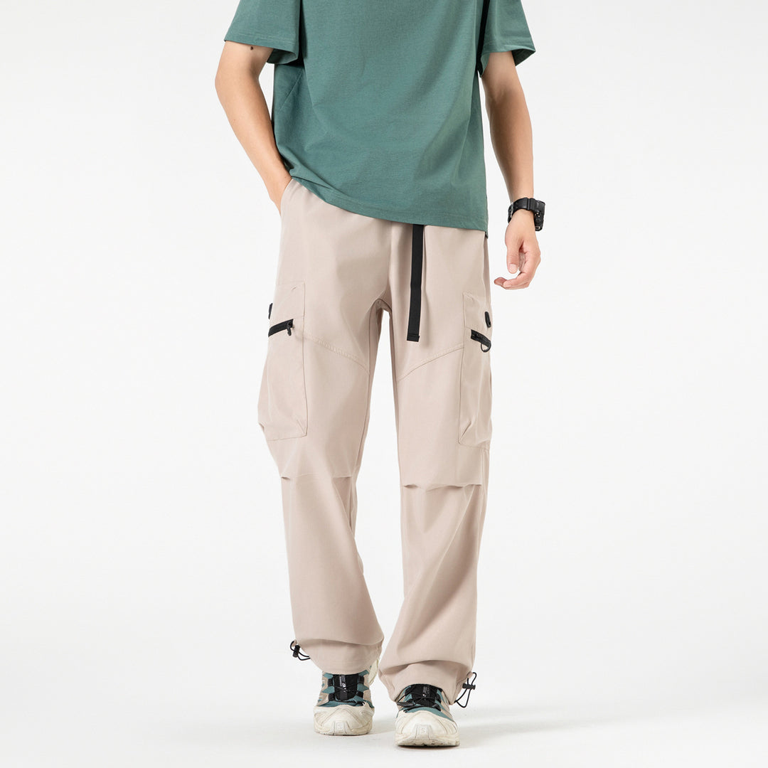 Men's wide technical cargo pants with multi pockets, drawstring and adjustable leg hems Drune