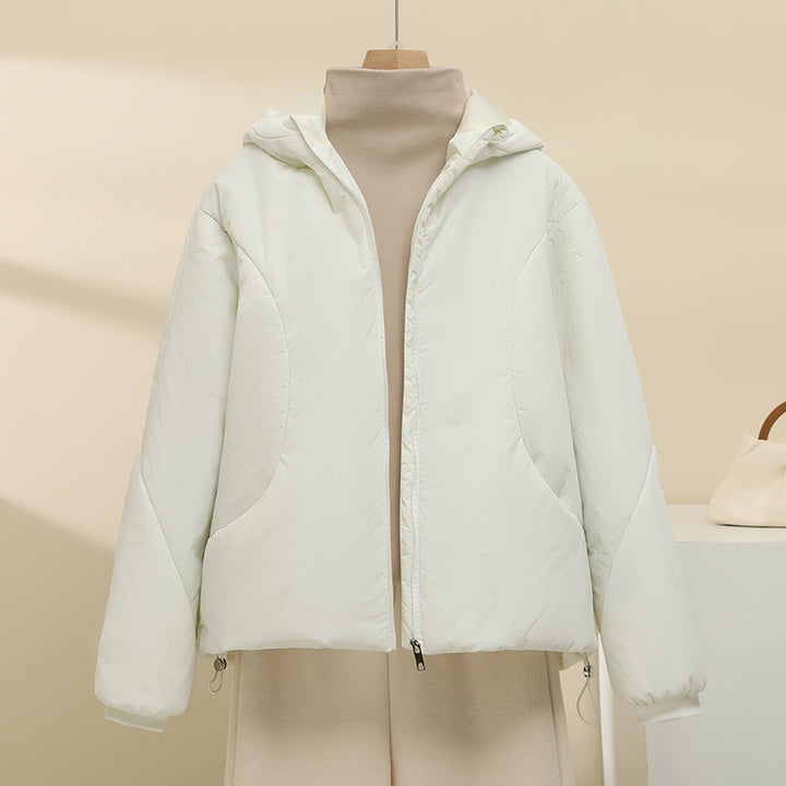 Women's quilted hooded jacket with short boxy cut, adjustable hem, and warming padding Mune Fashion