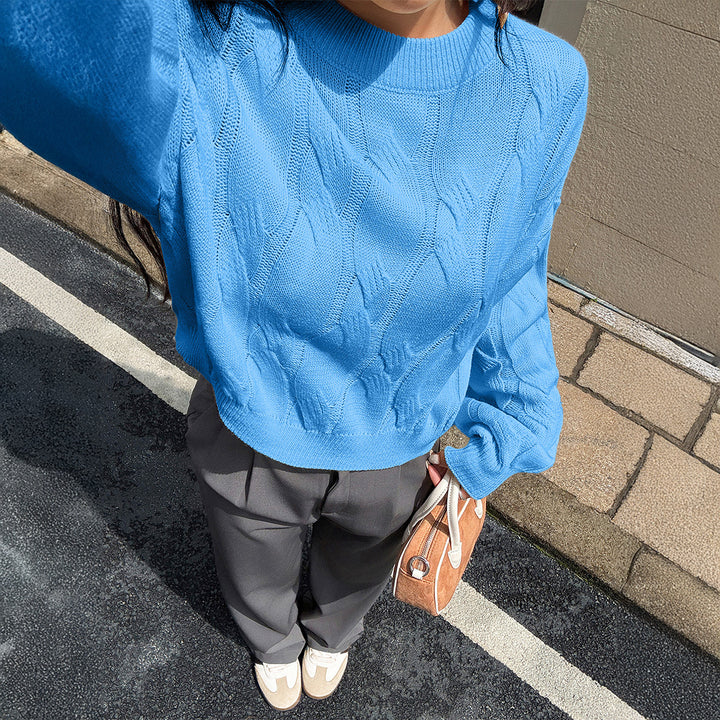 Women's cropped cable knit sweater with boxy silhouette, dropped shoulder, and ribbed hem Mune Fashion