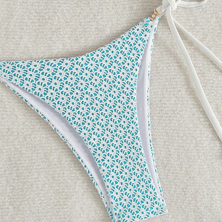 Ladies triangle bikini with playful flower print Mune Fashion