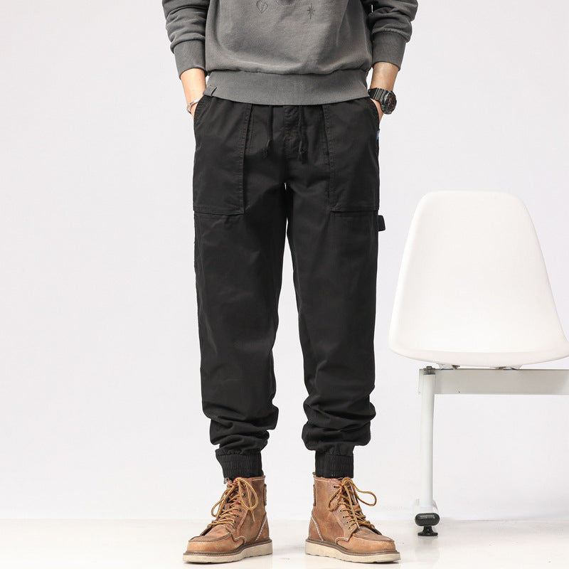 Men's workwear cargo pants in tech jogger style with applied front pockets, hammer loop, and ankle zippers Drune