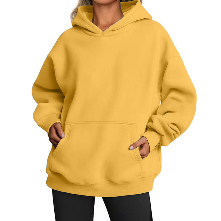 Women's oversized hooded sweatshirt with raglan sleeves, kangaroo pocket and soft fleece lining Mune Fashion