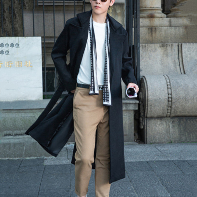 Men's long cut wool coat in minimalist design with generous shawl collar and concealed button placket Mune Fashion