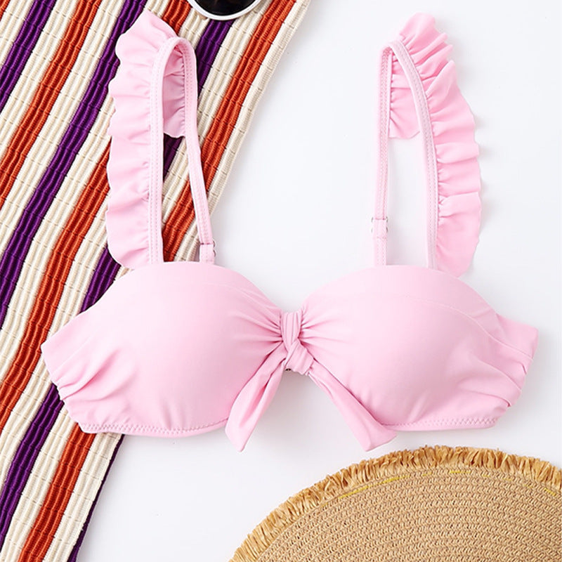 Women's triangle bikini top with playful ruffle design and knot-shaped neckline Mune Fashion