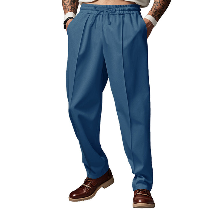 Men's sporty joggers with elastic waistband and front center seam Mune Fashion