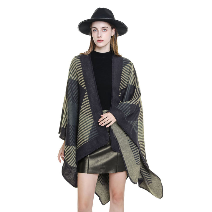 Women’s cape poncho made of wool blend with geometric striped jacquard and open edge seam Mune Fashion