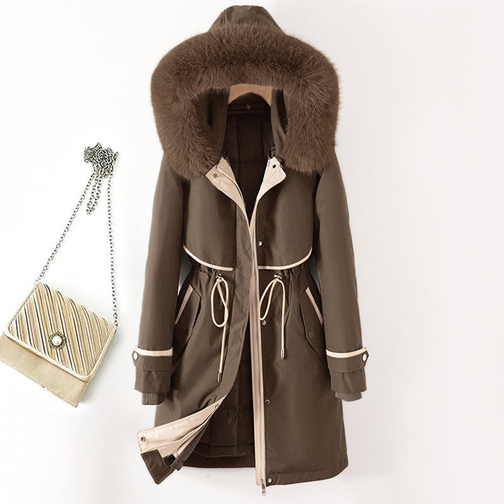 Women's long parka with faux fur hood, waist drawstring, and contrasting piping Mune Fashion