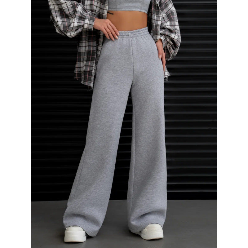 Women's flowing palazzo lounge pants with extra wide leg, elastic comfort waistband, and discreet side pockets Mune Fashion