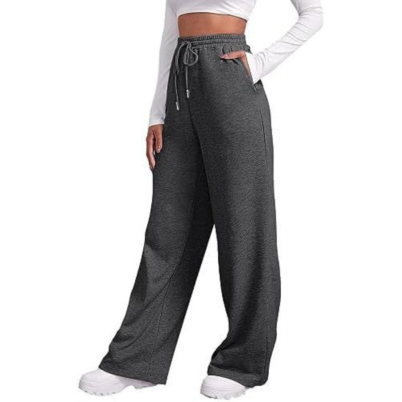 Women's flowing high-waist palazzo lounge pants made of lightweight jersey with elastic waistband and practical side pockets Mune Fashion