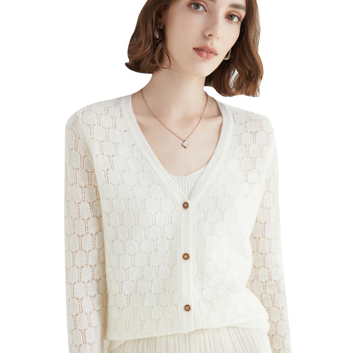 Women's ultralight mock neck pullover made of cashmere-like fine knit with extended hemline.