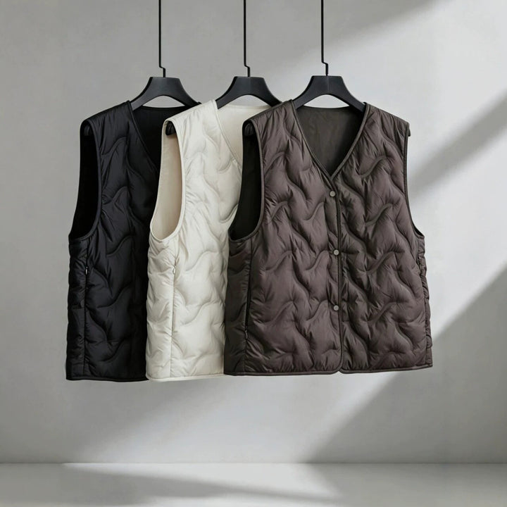 Women’s lightly padded quilted vest with V-neck and press studs Mune Fashion