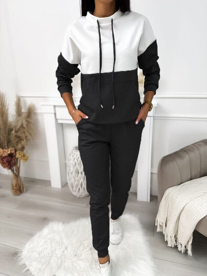 Women's two-piece loungewear set with stand-up collar, kangaroo pocket, and slim joggers Mune Fashion