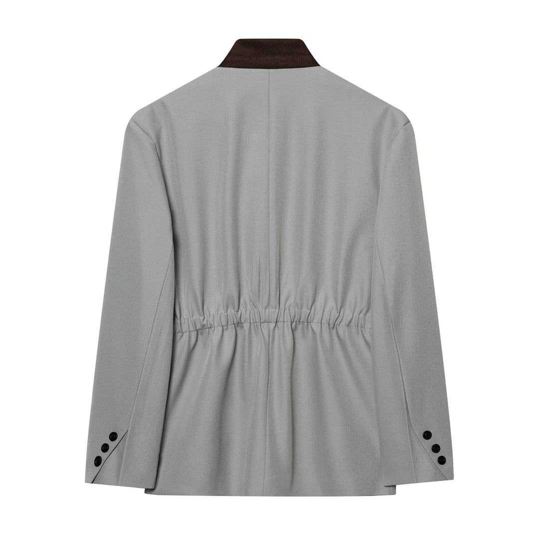 Women's short blazer in a minimalist clean look with stand-up collar and concealed button placket Mune Fashion