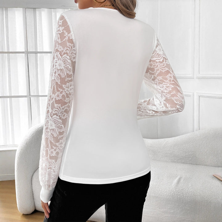 Women's figure-hugging lace top with V-neck, sheer lace sleeves and rhinestone trim Mune Fashion