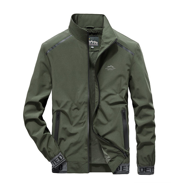 Men's softshell jacket with reflective inserts, water-repellent zip pockets, and high stand-up collar Mune Fashion