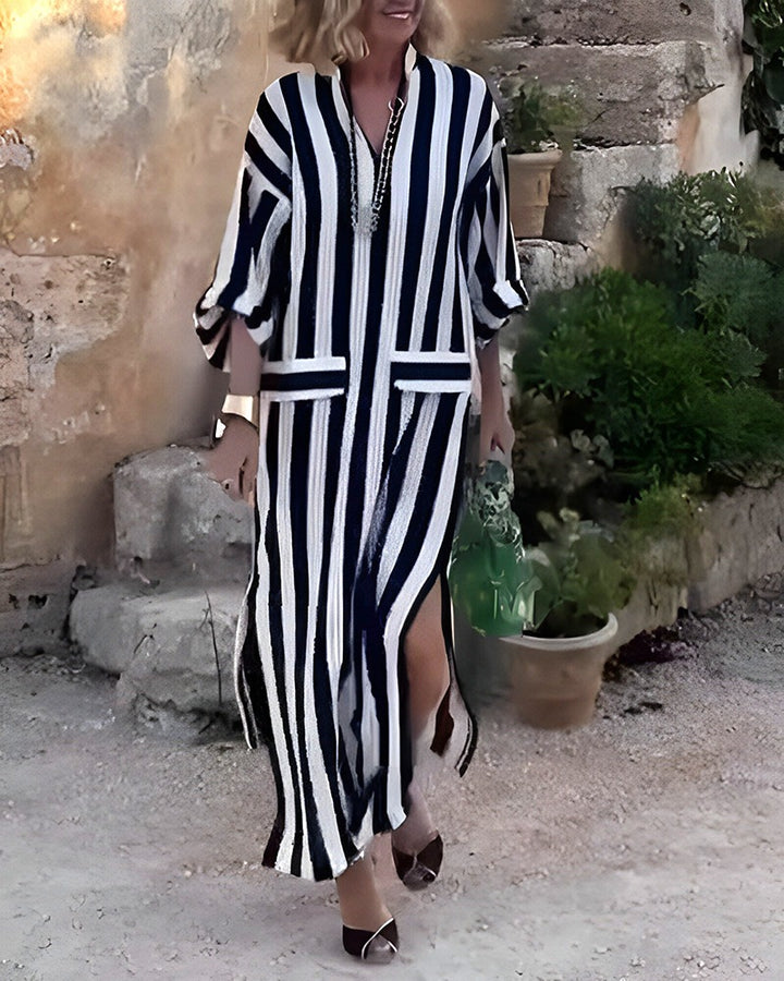 Women casual long shirt dress with vertical stripe pattern, V-neck, patch pockets, and high side slit Mune Fashion