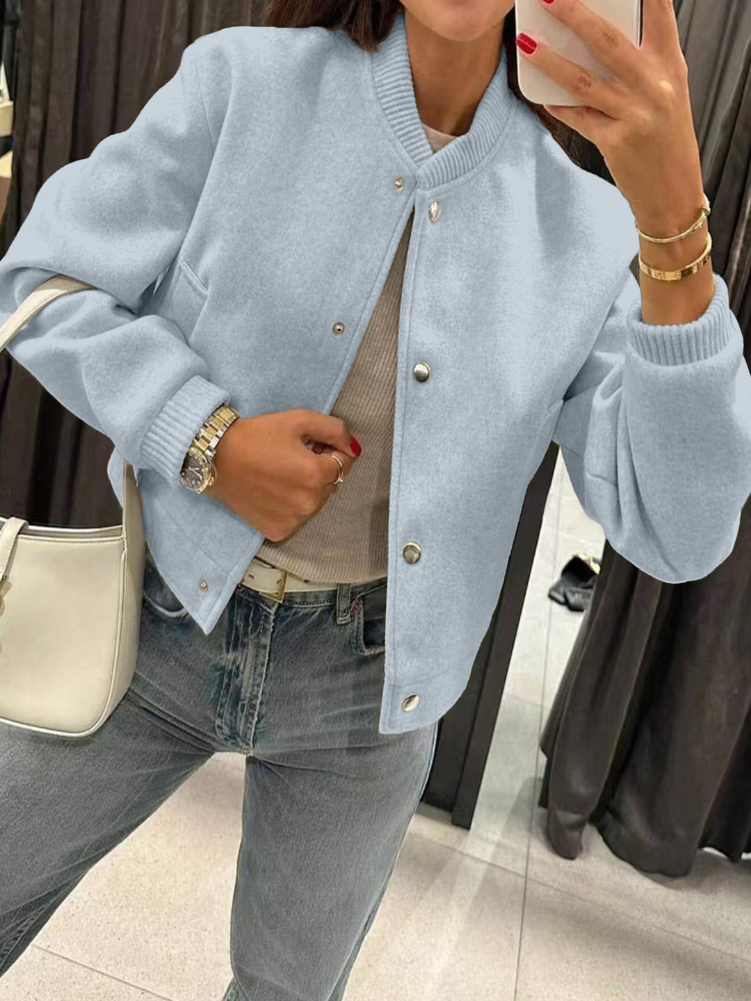 Women's short bomber-style jacket made of teddy fleece with ribbed cuffs Drune