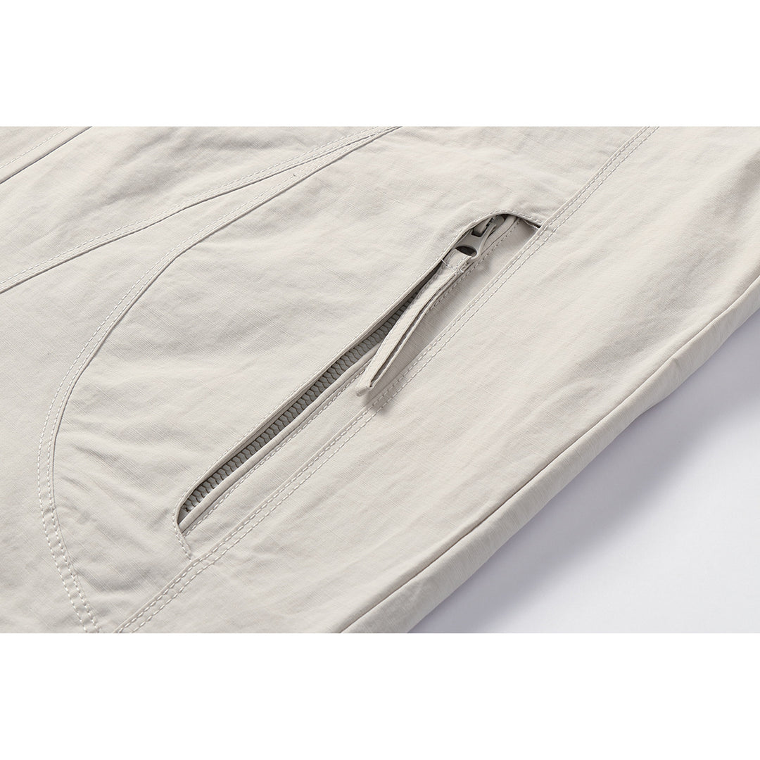 Unisex Light windproof hooded jacket in boxy cut with drawstring and concealed front Mune Fashion